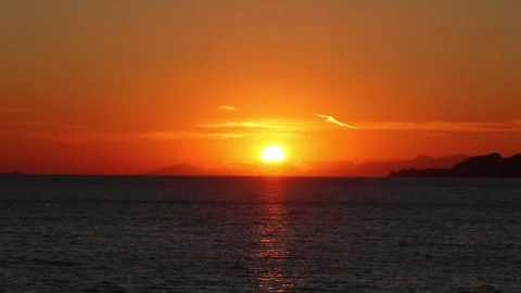 Dramatic Sunset Over The Greek Coastline With Vibrant Evening Sky Stock Footage 339961202