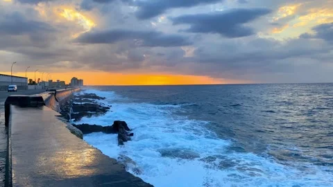 Dramatic Sunset Over Havana's Malecon with Crashing Waves Stock Footage 291113233