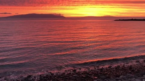 Dramatic sunset over island. Dramatic sky.  Stock Footage 132761646