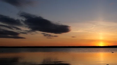 Dramatic sunset over lake Stock Footage 91069405