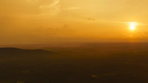 Dramatic sunset over a landscape - Time lapse Stock Footage 118580919