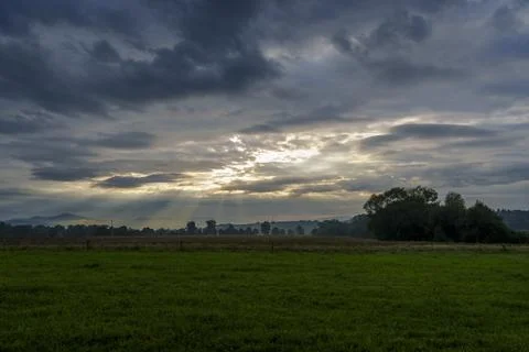 Dramatic Sunset Over Meadow Stock Photos