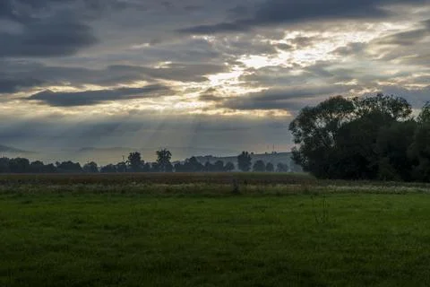 Dramatic Sunset Over Meadow Stock Photos