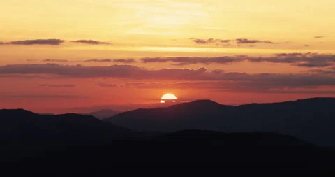 Dramatic sunset over mountain hills, aerial view Stock Footage 139765914