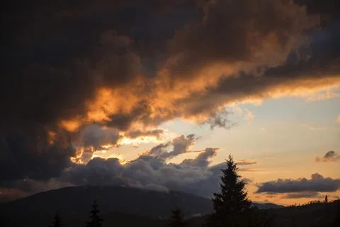 Dramatic Sunset Over Mountain Landscape Stock Photos