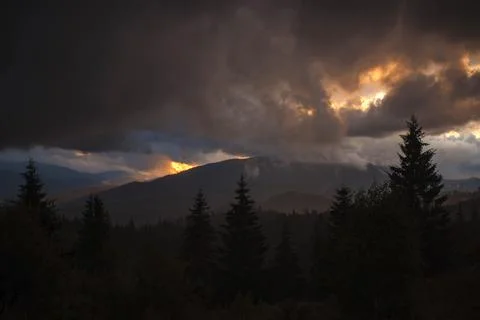 Dramatic Sunset Over Mountain Landscape Stock Photos