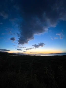 Dramatic Sunset Over the Ocean Horizon Stock Photos