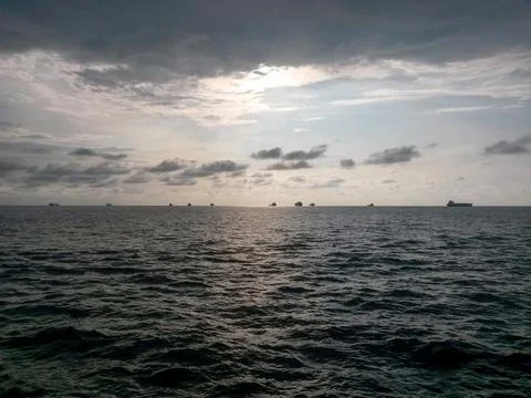 Dramatic sunset over the ocean Stock Photos