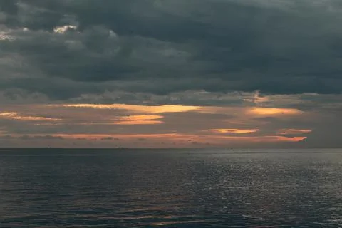 Dramatic Sunset Over the Ocean Stock Photos
