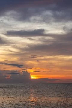 Dramatic Sunset Over the Ocean Stock Photos