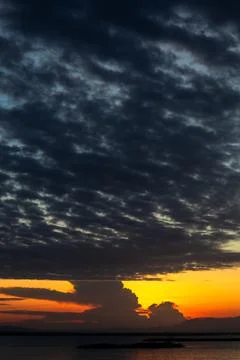 Dramatic Sunset Over the Ocean 写真素材