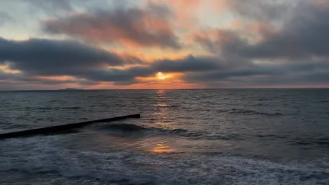 Dramatic Sunset Over Ocean Waves Video stock 341630170
