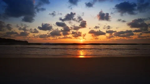 Dramatic Sunset over a Phuket Beach, with Sound. UHD 4k video Stock Footage 82974010