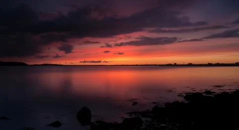 Dramatic sunset over Poole Harbour Stock Photos