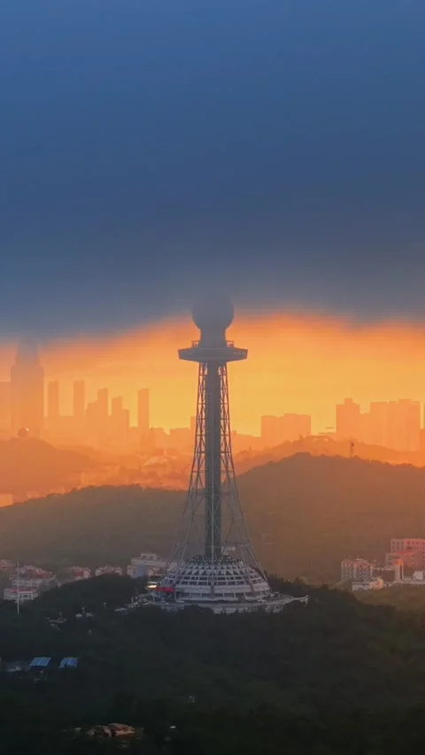 Dramatic Sunset over Qingdao City and TV Tower Stock Footage 330733027