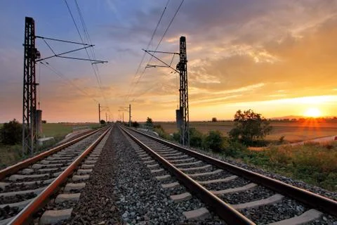 Dramatic sunset over railroad Stock Photos