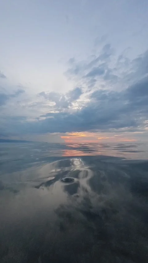 Dramatic Sunset Over Reflective Tidal Flats Stock Footage 344617746