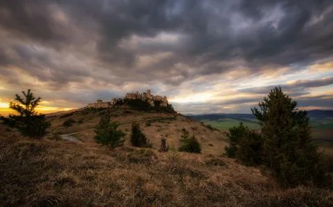 Dramatic sunset over the ruins of Spis Castle in Slovakia Stock Photos
