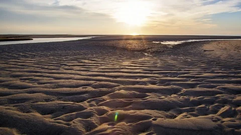 Dramatic Sunset over Salt Flats Sand Textures Background Stock Video Time Lapse Video stock 72801814