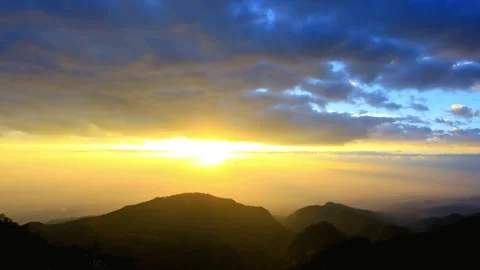 Dramatic Sunset Over Silhouetted Mountainscape Stock Footage 311586160