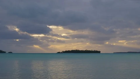 Dramatic sunset over small tropical islands Stock Footage 107891576