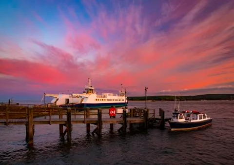 Dramatic Sunset over Swanage Ferry in Poole Harbour Stock Photos