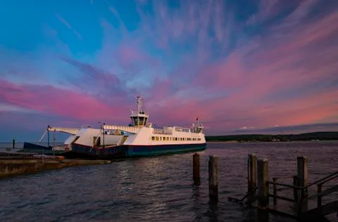Dramatic Sunset over Swanage Ferry in Poole Harbour Stock Photos