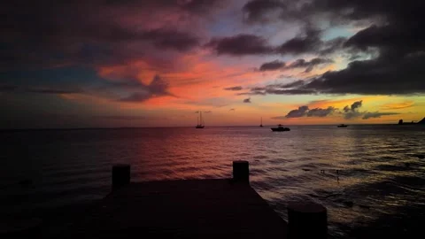 Dramatic Sunset over a Tropical Dock in Los Roques Stock Footage 338427501