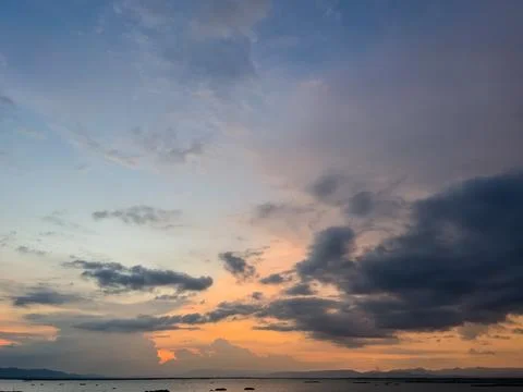Dramatic Sunset Over the Water Stock Photos