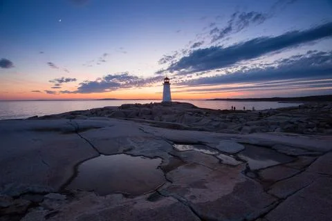 Dramatic sunset at Peggy's Cove Lighthouse Atlantic Coast Nova Scotia Canada Foto stock