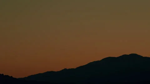 Dramatic Sunset Rays Behind Silhouette Of Mountain. Gradient Vivid Nature Stock Footage 265114541