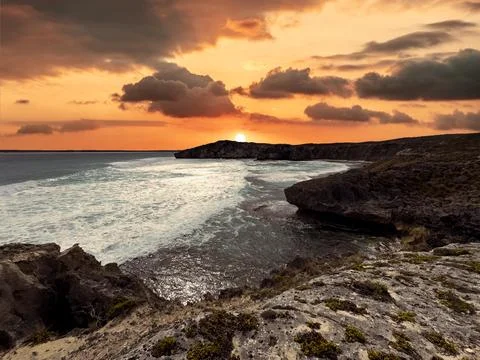 Dramatic sunset on the rugged coastline of Kangaroo Island at Little Sahara Stock Photos