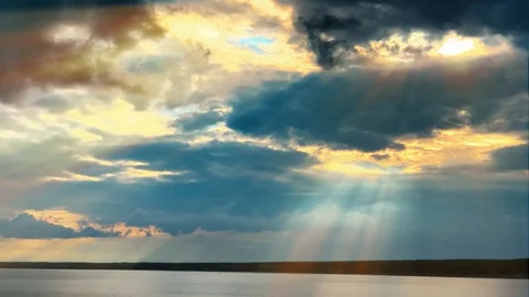 Dramatic sunset in the sea against the backdrop of mountains. 4K 60 fps footage. Stock Footage 108663555