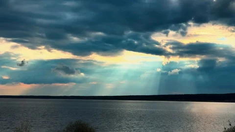 Dramatic sunset in the sea against the backdrop of mountains. 4K 60 fps footage. Stock Footage 108664077
