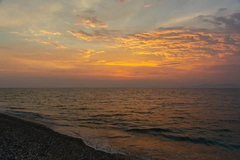 Dramatic sunset on the sea Stock Photos