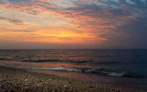 Dramatic sunset on the sea Stock Photos