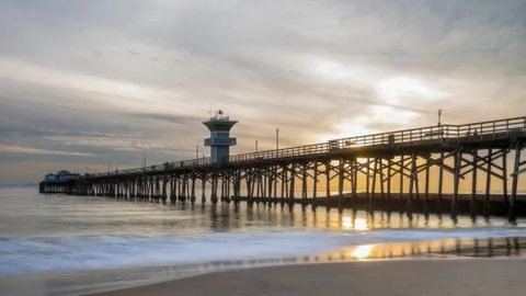 Dramatic sunset at seal beach pier in orange county california Stock Photos