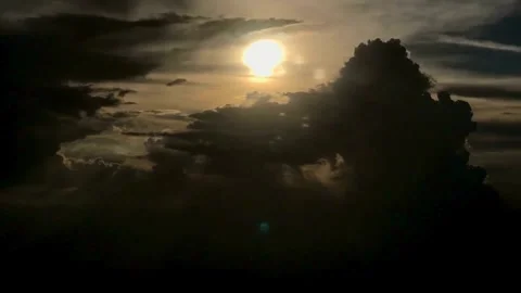 Dramatic Sunset Silhouette with Dark Clouds and Golden Light Stock Footage 310418855