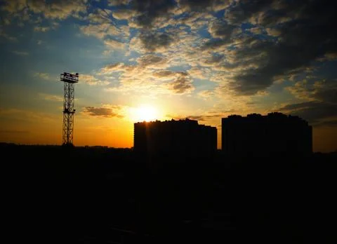 Dramatic sunset silhouette of two buildings background Foto stock
