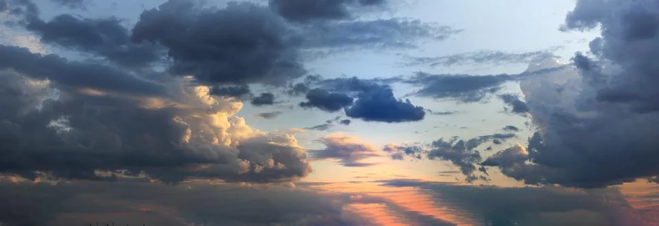 Dramatic sunset skies, cloudscape of rich color twilight sky. Sunset cloud .. Stock Photos
