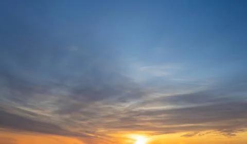 Dramatic sunset skies, cloudscape of rich color twilight sky. Sunset cloud .. Stock Photos