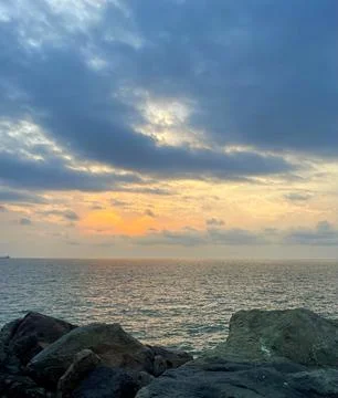 Dramatic Sunset Sky Above the Ocean Stock Photos