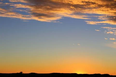 Dramatic sunset sky and beautiful clouds Stock Photos