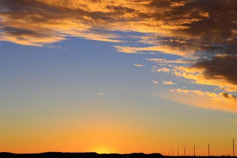 Dramatic sunset sky and beautiful clouds Stock Photos