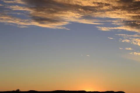 Dramatic sunset sky and beautiful clouds Stock Photos