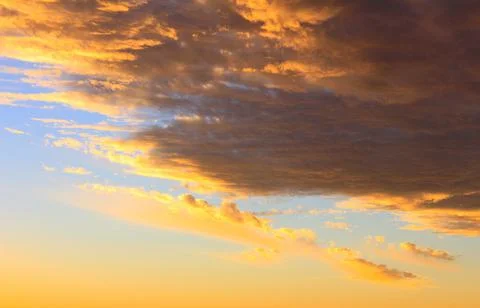Dramatic sunset sky and beautiful clouds Stock Photos