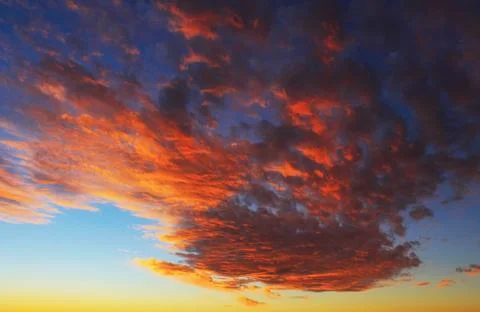 Dramatic sunset sky and beautiful clouds Stock Photos
