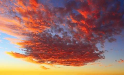 Dramatic sunset sky and beautiful clouds Stock Photos