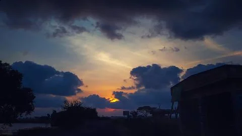 Dramatic sunset sky with clouds, Beautiful landscape during sunset Stock Photos