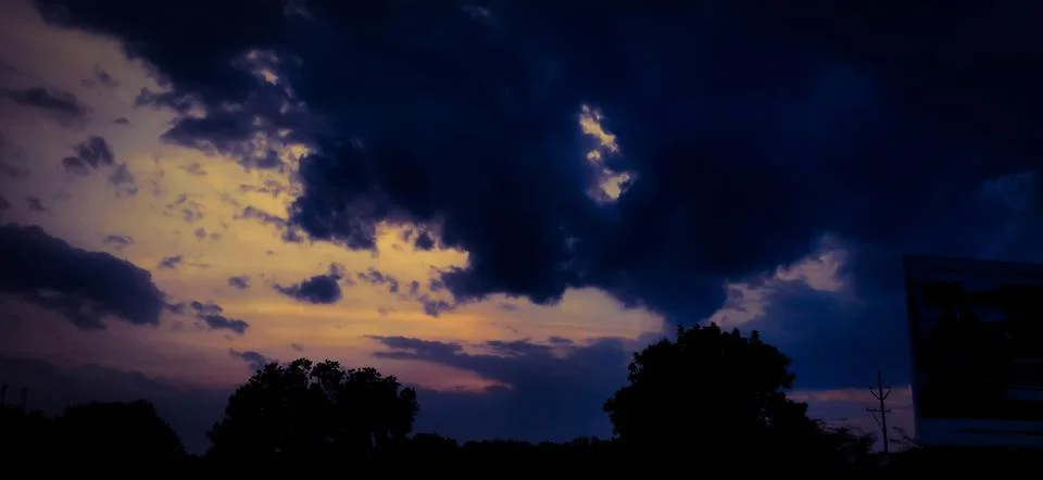 Dramatic sunset sky with clouds, Beautiful landscape during sunset Stock Photos